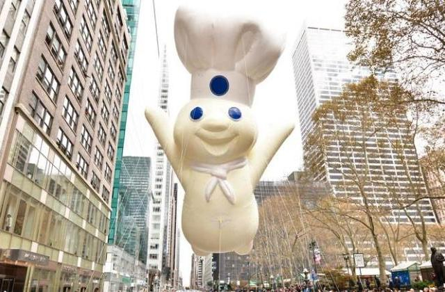 The Pillsbury Dough Boy as a massive float above the Macy's parade.