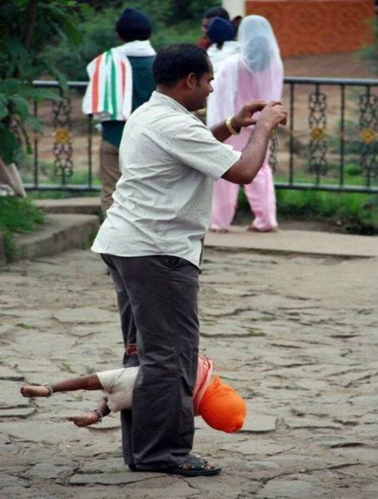 picture of a father using a smart phone