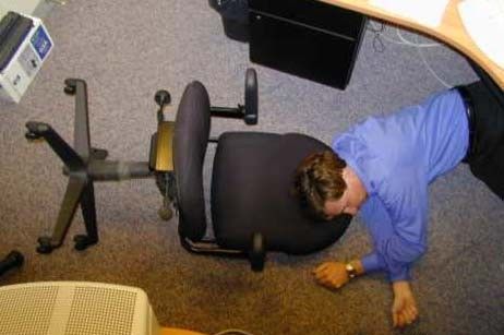 Funny Pictures of Man Sleeping on Office Floor