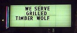 Funny Jokes Picture of a Sign Announcing Served Timber Wolf