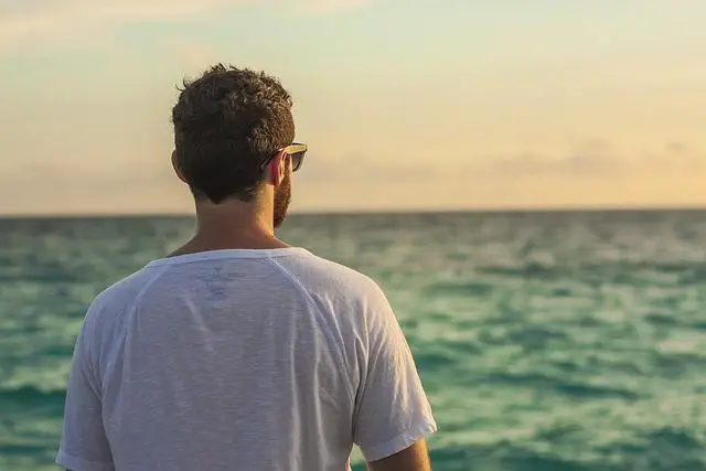 man back ocean