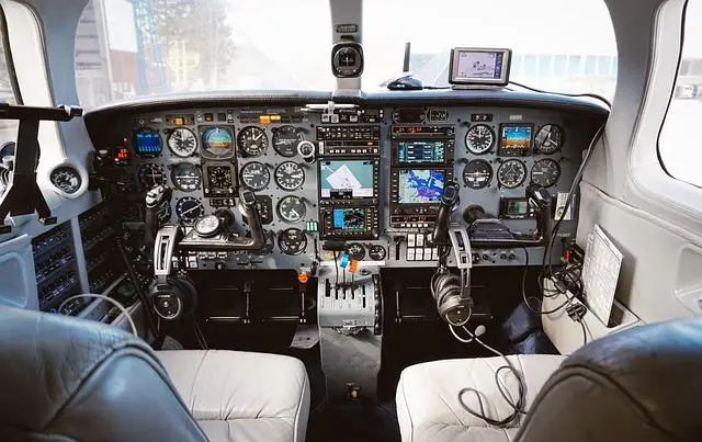 A photo of the gauges in a airplane cockpit.
