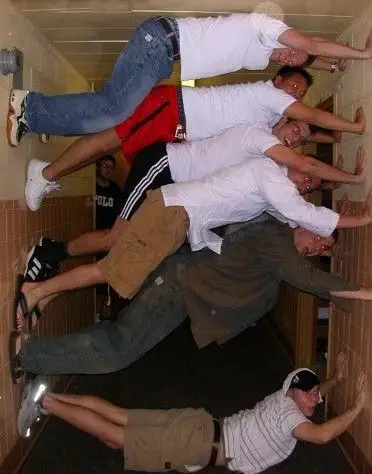 Funny Pictures of Students Climbing The Wall