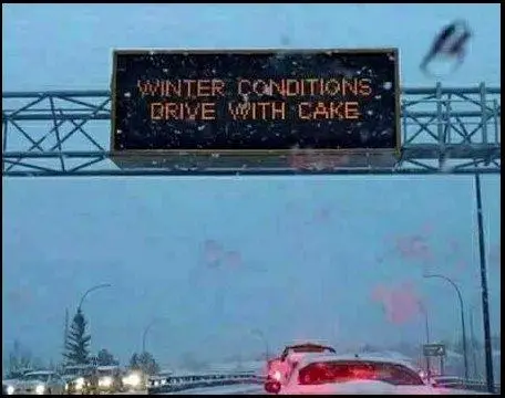 A funny road sign with winter driving advice from Marie Antoinette Marie Antoinette gives winter driving advice on a road sign