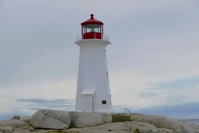 The lighthouse at Peggy's Cove on an overcast day and with no people.